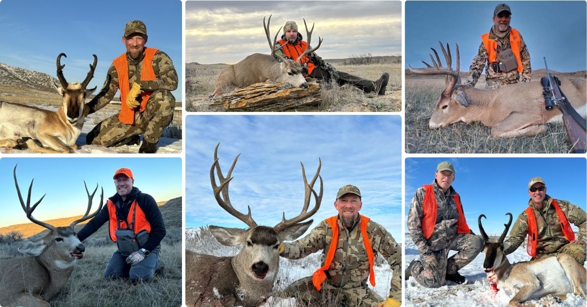 Hunters posing with their mule deer and antelope trophies