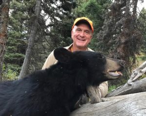Hunt with his black bear. He has hunted with SNS Outfitter & Guides for over twenty-three years.