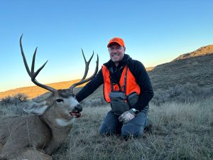 male hunter with trophy mule deer from a guided hunt with SNS Outfitter and guides in Montana 